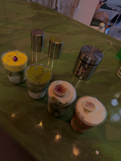An iced coffee beside a matcha