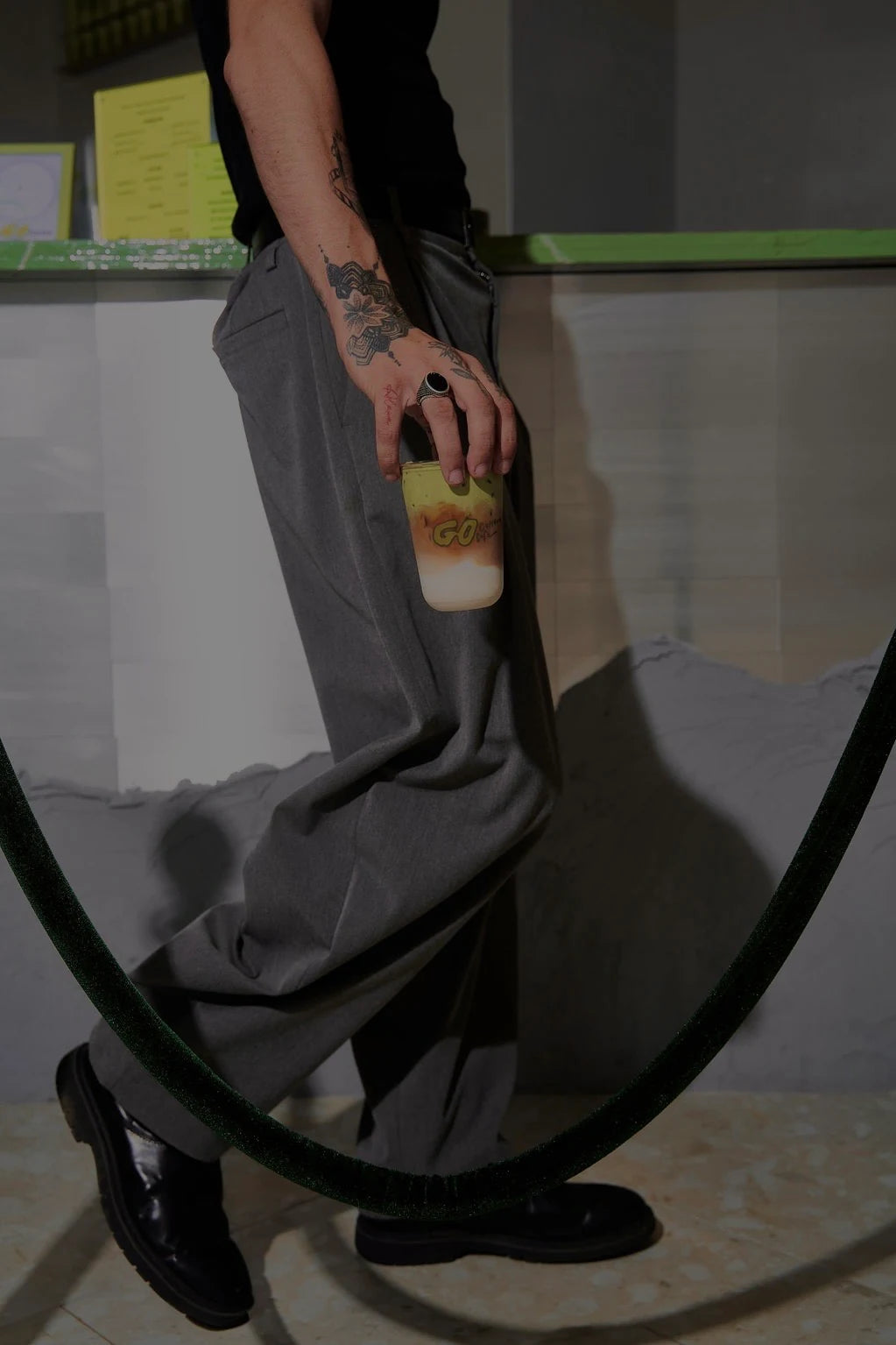 A Go Culture iced matcha carried out past the counter
